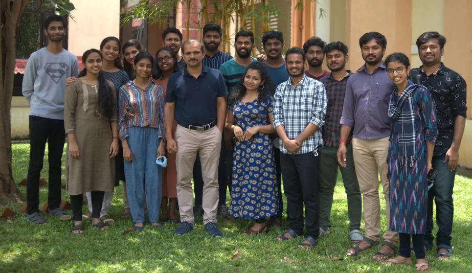 Research group photograph outdoors at IISER Thiruvananthapuram